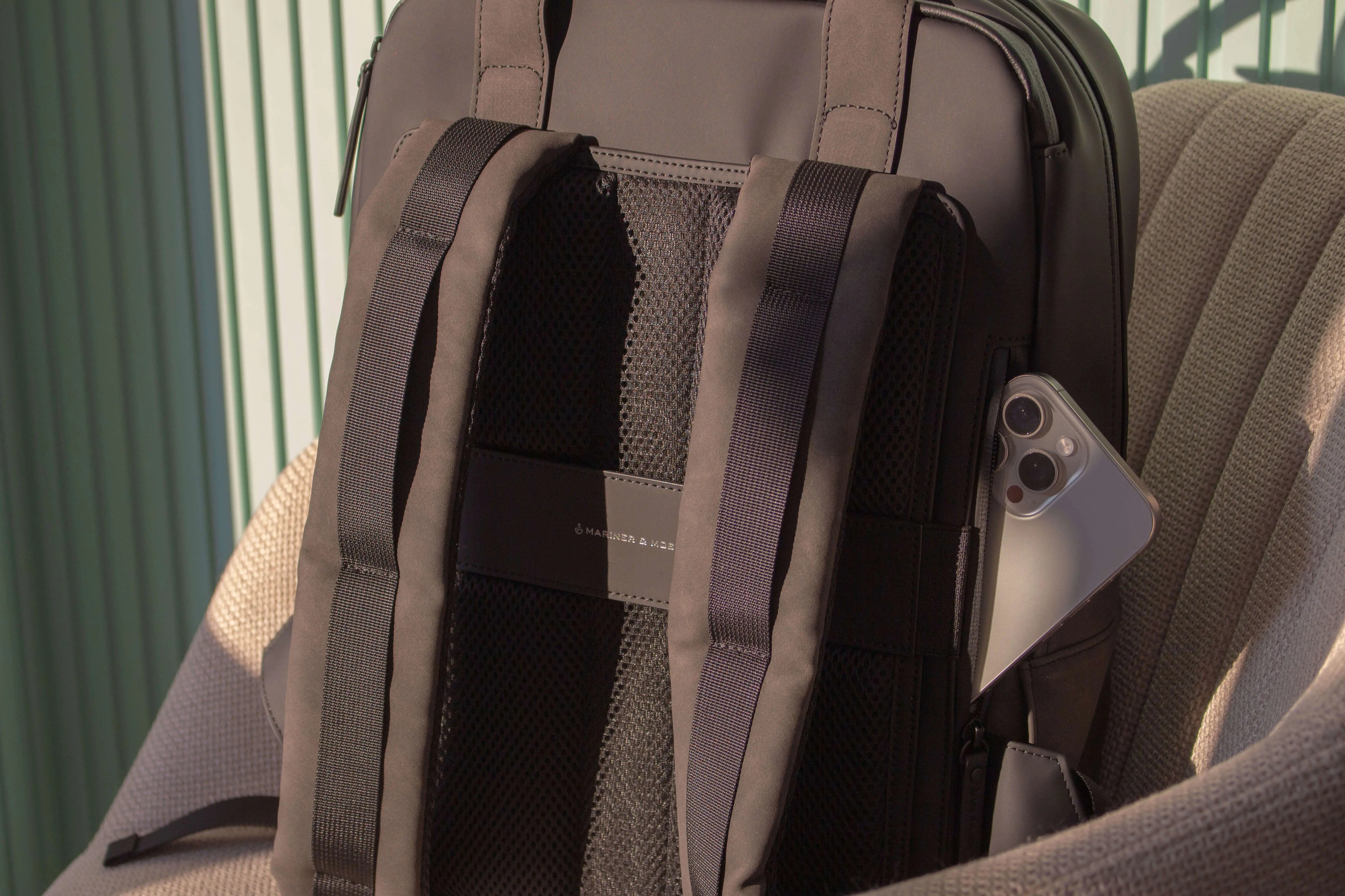 Black backpack with a phone inside